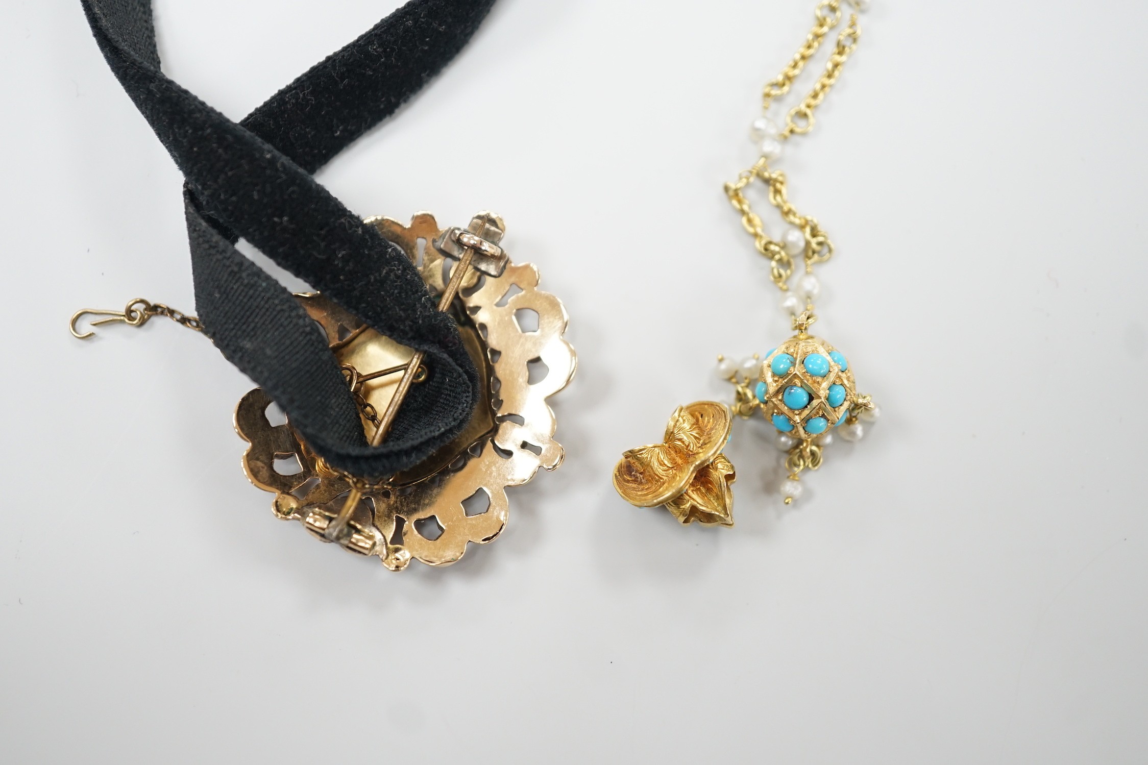 A Victorian yellow metal, enamel and gem set brooch, 37mm, with black sash, together with a yellow metal, turquoise and seed pearl set pendant necklace and a yellow metal and turquoise set small pendant on a damaged 9ct